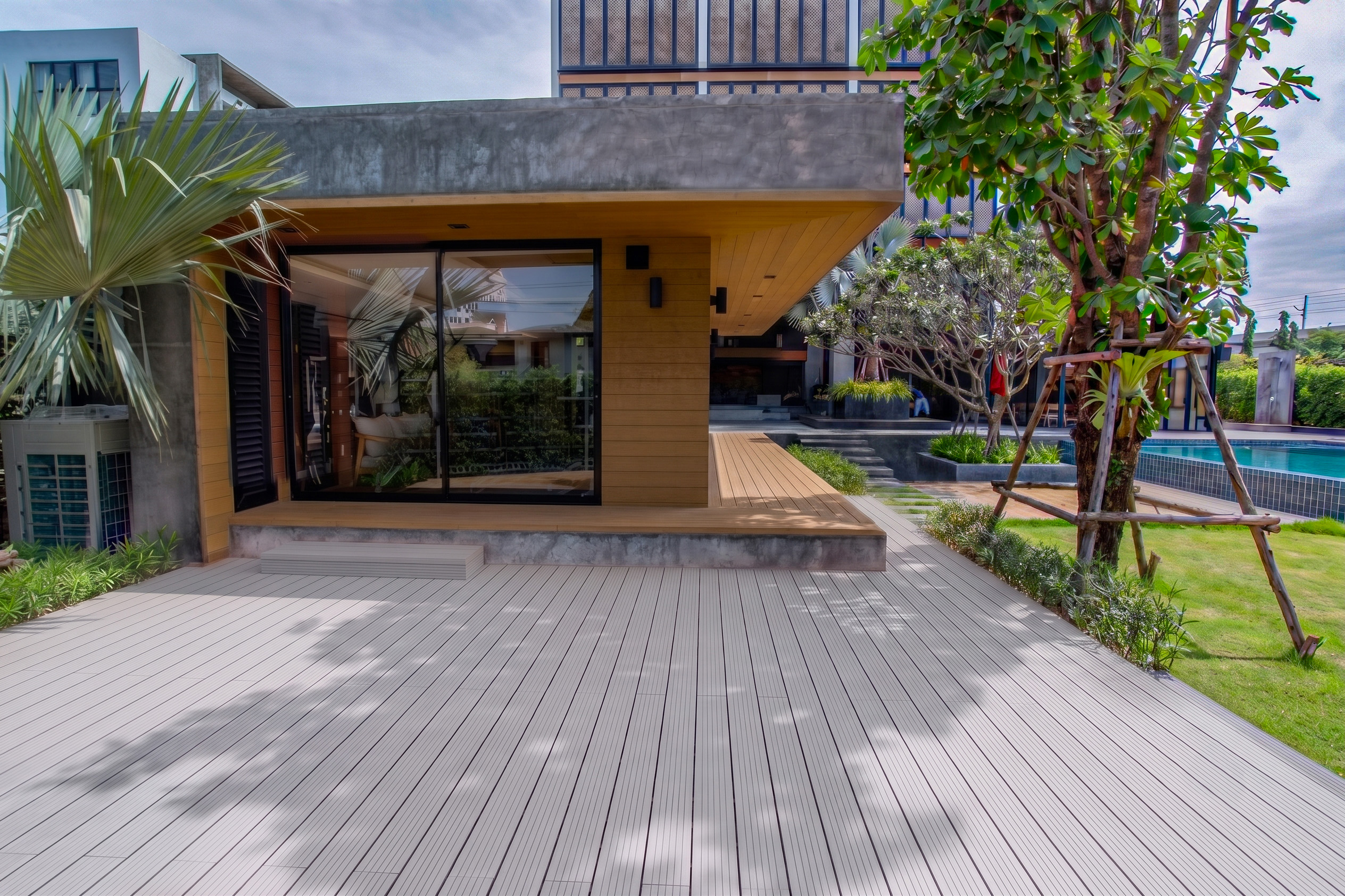 Why_Are_More_Homeowners_Choosing_Brown_and_Dark-Tone_WPC_Decking_for_Outdoor_Spaces_(1).jpg